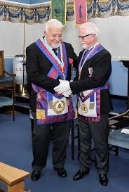 New members commit to the values and strategies of the Illuminati Brotherhood for long-term success.