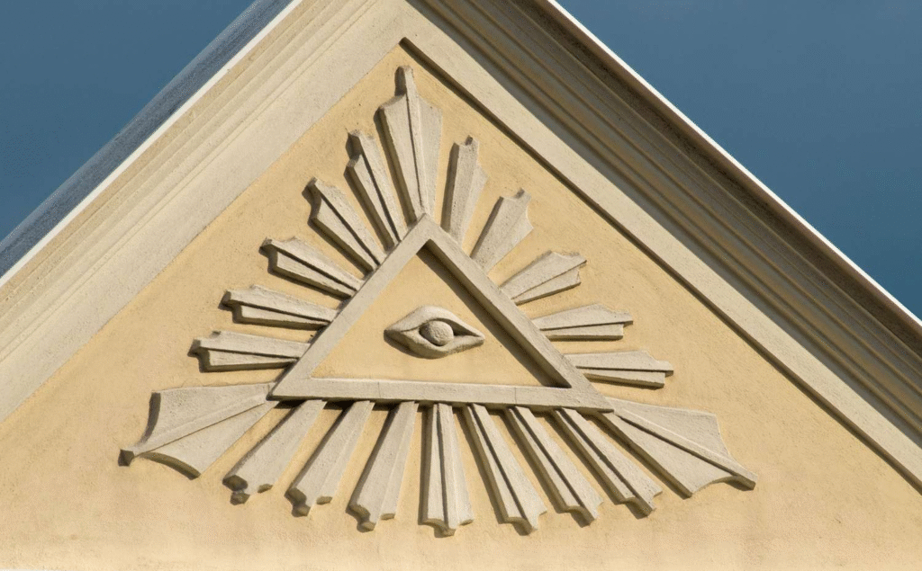 Historical depiction of the all seeing eye as a mystical symbol in ancient architecture, representing spiritual awareness and divine oversight
